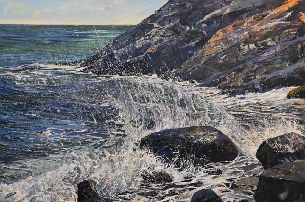 Waves crashing against rocky cliffs in a turbulent seascape with dynamic movement.